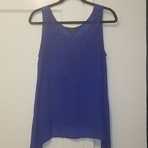 Royal blue sleeveless top.